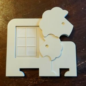 Tupperware Magnetic Picture Frame.  Holds a 1.5" x 2" photo.